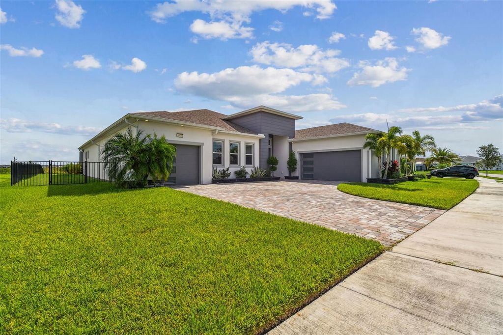 Photo of 8936 Sanders Tree Loop, Wesley Chapel, FL 33545 (MLS # O6299274)