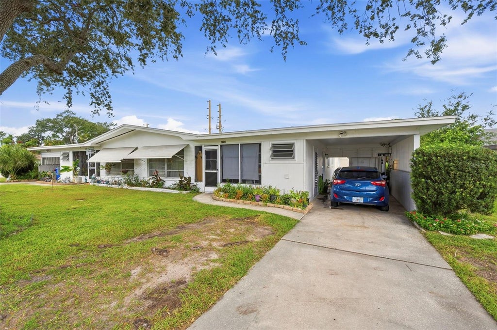 Photo of 1154 Angle Road, Dunedin, FL 34698 (MLS # TB8550111)