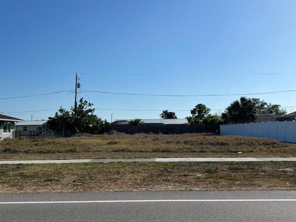 Photo of 2491 Lake View Boulevard, Port Charlotte, FL 33948 (MLS # O6295295)