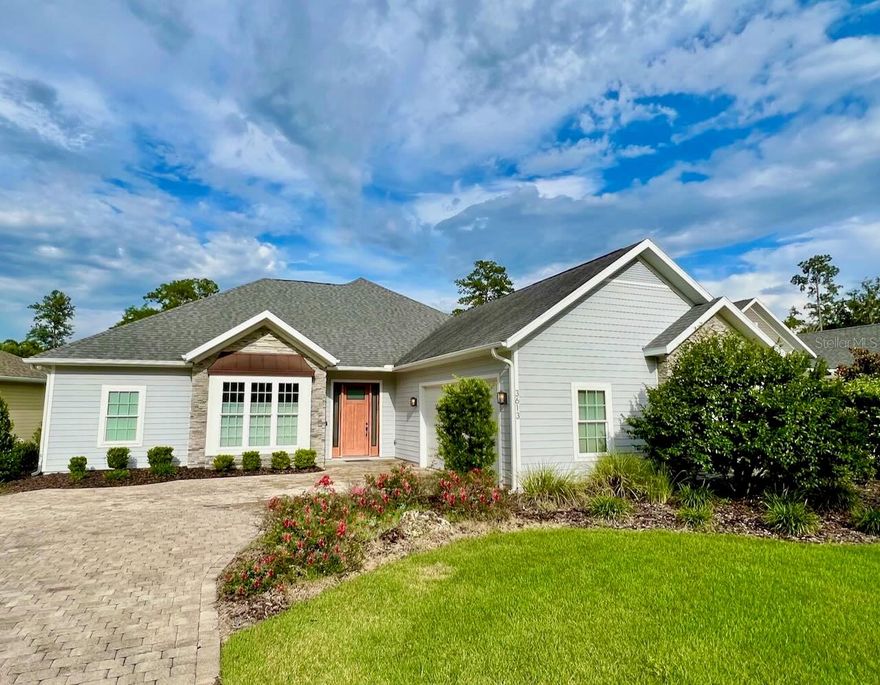 Now priced $15,000 below appraisal! Beautiful 2017 Lash built custom home. This 3/2 with a spacious study includes extensive features and upgrades including: Stone pavers in driveway and porches, 2x6 Exterior walls, Architectural shingles, 10’ ceilings, Crown molding, wood floors, HVAC 16 SEER with two stage heat pump and variable speed fan, Tankless electric hot water heater, Ceiling mounted wireless router, Family room wired for Surround sound, Wireless security system, Logitech doorbell camera, Moen motion sensing kitchen faucet, LED Over and under kitchen counter lighting, ADA height toilets, Large above the garage attic storage, Top down bottom up honeycomb shades throughout, AT&T Gigafiber community.  A must see home in the NW.