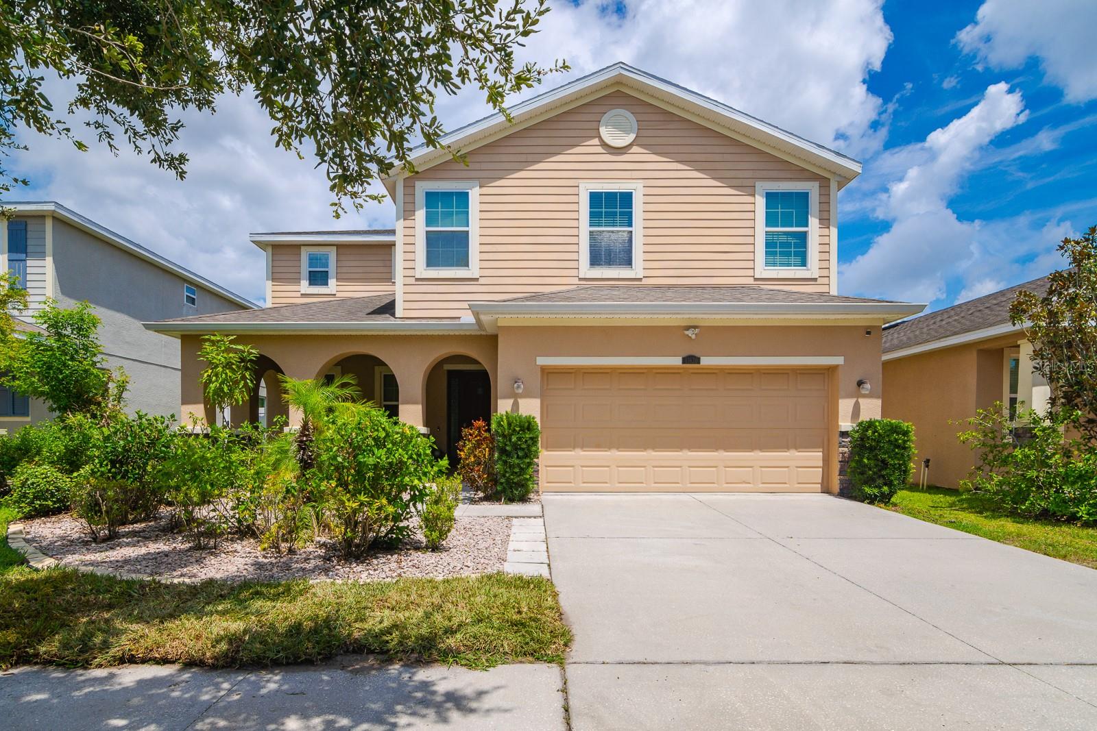 Spacious, Stylish & Designed for Living—Welcome Home to This 5-Bedroom Gem in the Heart of Riverview! Looking for space to spread out, entertain, and live comfortably? This 3,737 sq ft home checks all the boxes and then some. With 5 true bedrooms, 4.5 baths, a dedicated office, loft, and bonus spaces throughout, this is the ideal layout for large households, multigenerational living, or anyone craving flexibility.
Step inside and be greeted by an impressive foyer with soaring ceilings and a wide staircase that anchors the open layout. Off the entry, you’ll find a private office and formal dining room with tray ceiling. The heart of the home is the expansive kitchen and living area, perfect for gatherings. Enjoy 42” cabinetry, granite countertops, a center island, and a walk-in pantry ready for all your hosting needs. Downstairs also features a private guest suite with its own en-suite bath and walk-in closet—ideal for in-laws or visitors. A full laundry room with a utility sink and a guest half-bath complete the first level. Upstairs, you'll find a versatile loft/bonus room, perfect for movie nights or a play space, with its own walk-in closet. The luxurious primary suite offers tranquil views, tray ceilings, two walk-in closets, dual vanities, a garden tub, and a separate shower. A junior suite with its own private bath and two additional bedrooms with a shared bath makes this layout incredibly functional. Enjoy Florida living outdoors with a charming front porch, screened patio, and a large fenced backyard with fruit trees. Thoughtful updates include neutral hypoallergenic carpet (2022), a newer water softener/purifier, and a dual-zone AC system with UV light (upstairs unit replaced 2021). Located in a quiet community with low HOA and no CDD fees, and close to shopping, dining, and great schools—this is Riverview living at its best. Seller offering a credit to paint the home's exterior!