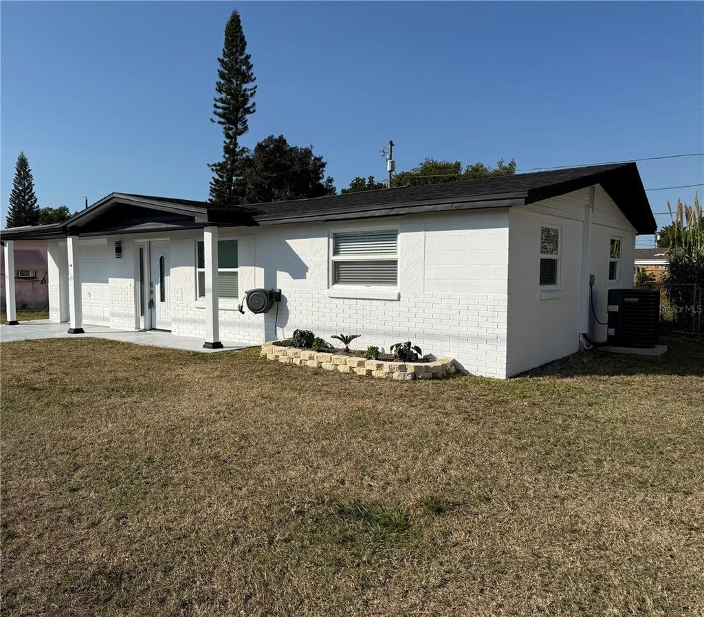 Photo of 5025 State Road 54, New Port Richey, FL 34652 (MLS # TB8449498)