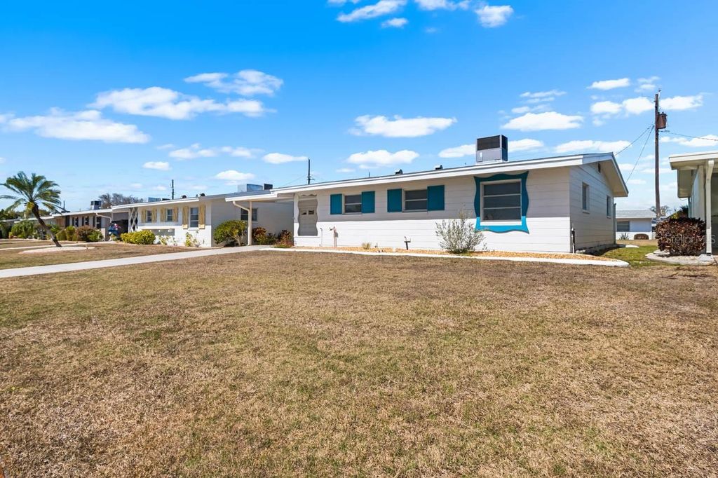 Photo of 1517 Chevy Chase Drive, Sun City Center, FL 33573 (MLS # TB8480107)