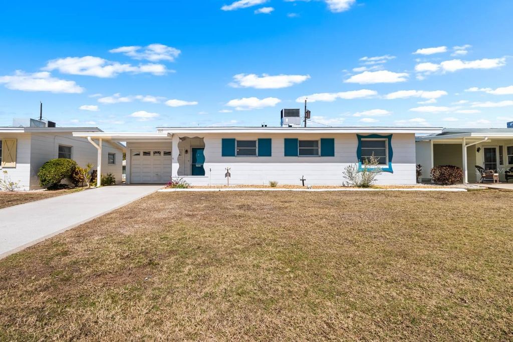 Photo of 1517 Chevy Chase Drive, Sun City Center, FL 33573 (MLS # TB8480107)