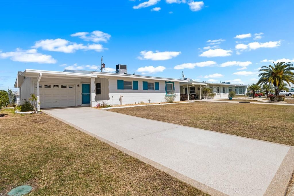 Photo of 1517 Chevy Chase Drive, Sun City Center, FL 33573 (MLS # TB8480107)