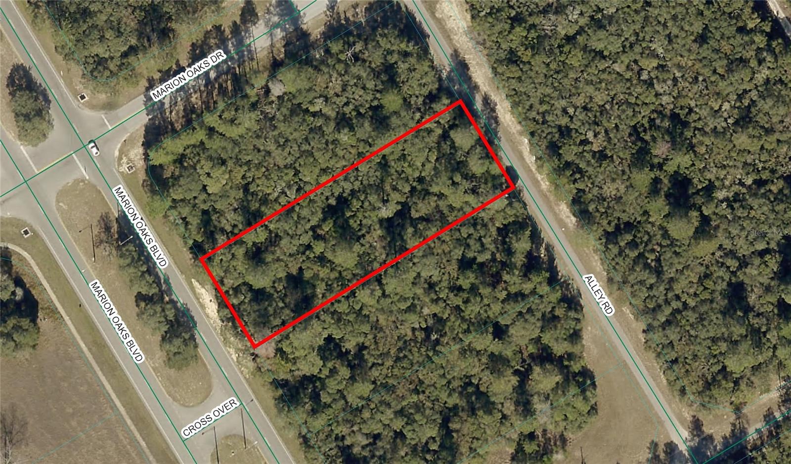 Excellent location for this commercially zoned .69 property right in the heart of Marion Oaks in Ocala. This property offers paved streets at both the front and rear, providing excellent access and visibility. It is strategically located across the street from the Winn-Dixie shopping plaza. This is a rare and outstanding investment opportunity for general contractors or investors looking to capitalize on a growing area with strong demand for retail or service businesses. The property right next door is also available which would be an amazing opportunity to purchase almost 1.5 acres. Hurry before it is gone!