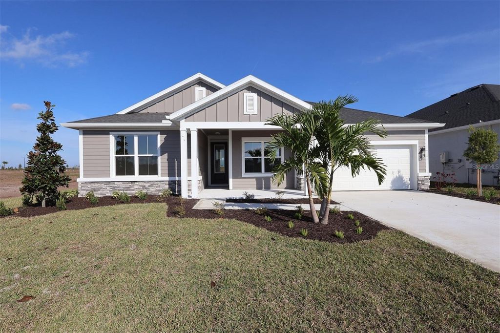 Photo of 12718 Driftwood Tide Drive, Palmetto, FL 34221 (MLS # TB8457498)