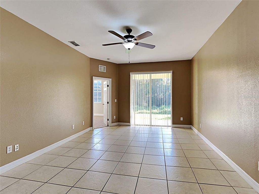 Photo of 176 Ocean Bluff Drive, Poinciana, FL 34759 (MLS # O6398573)
