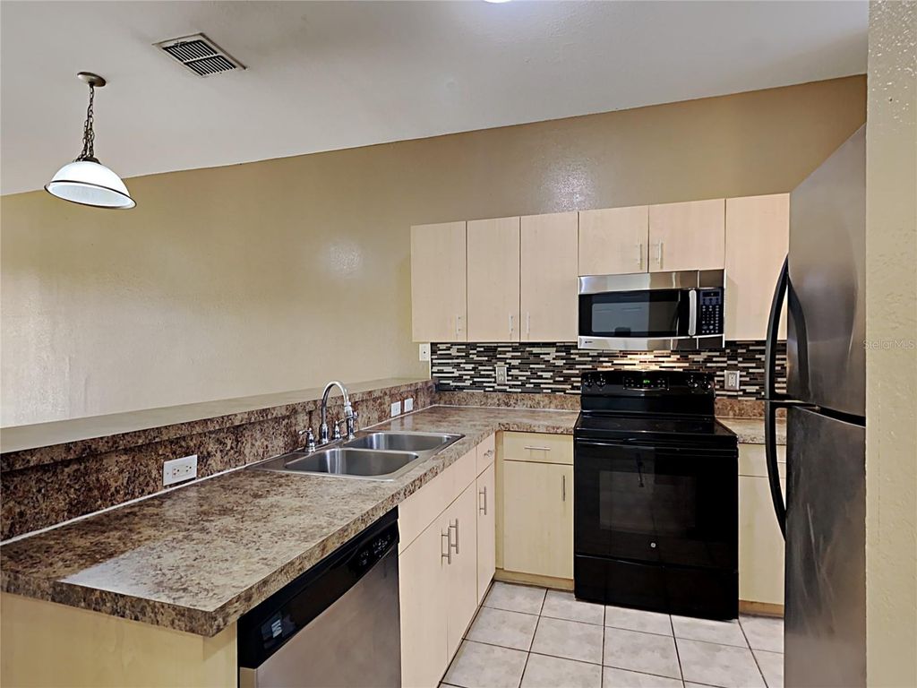 Photo of 176 Ocean Bluff Drive, Poinciana, FL 34759 (MLS # O6398573)