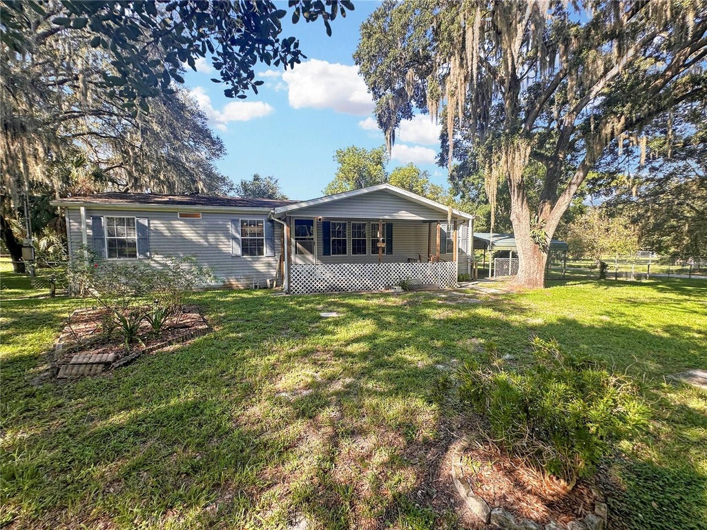 Photo of 10700 Tami Trail, Hudson, FL 34669 (MLS # W7889178)