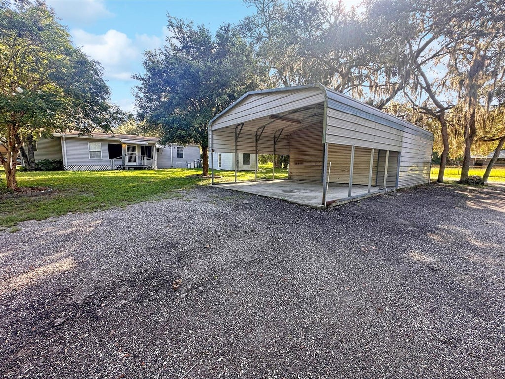 Photo of 10700 Tami Trail, Hudson, FL 34669 (MLS # W7889178)
