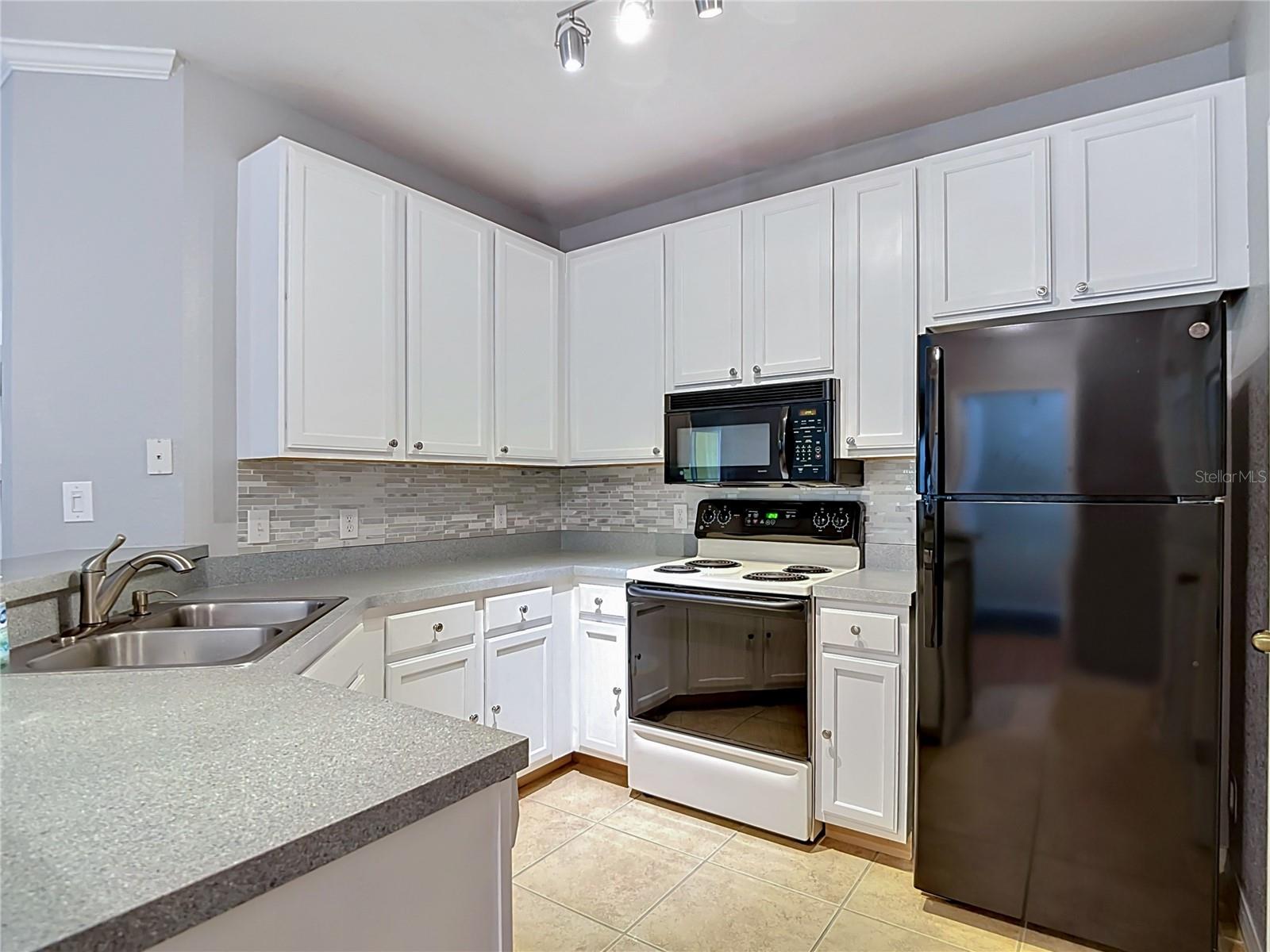 COURTNEY PALMS CONDO - Residential