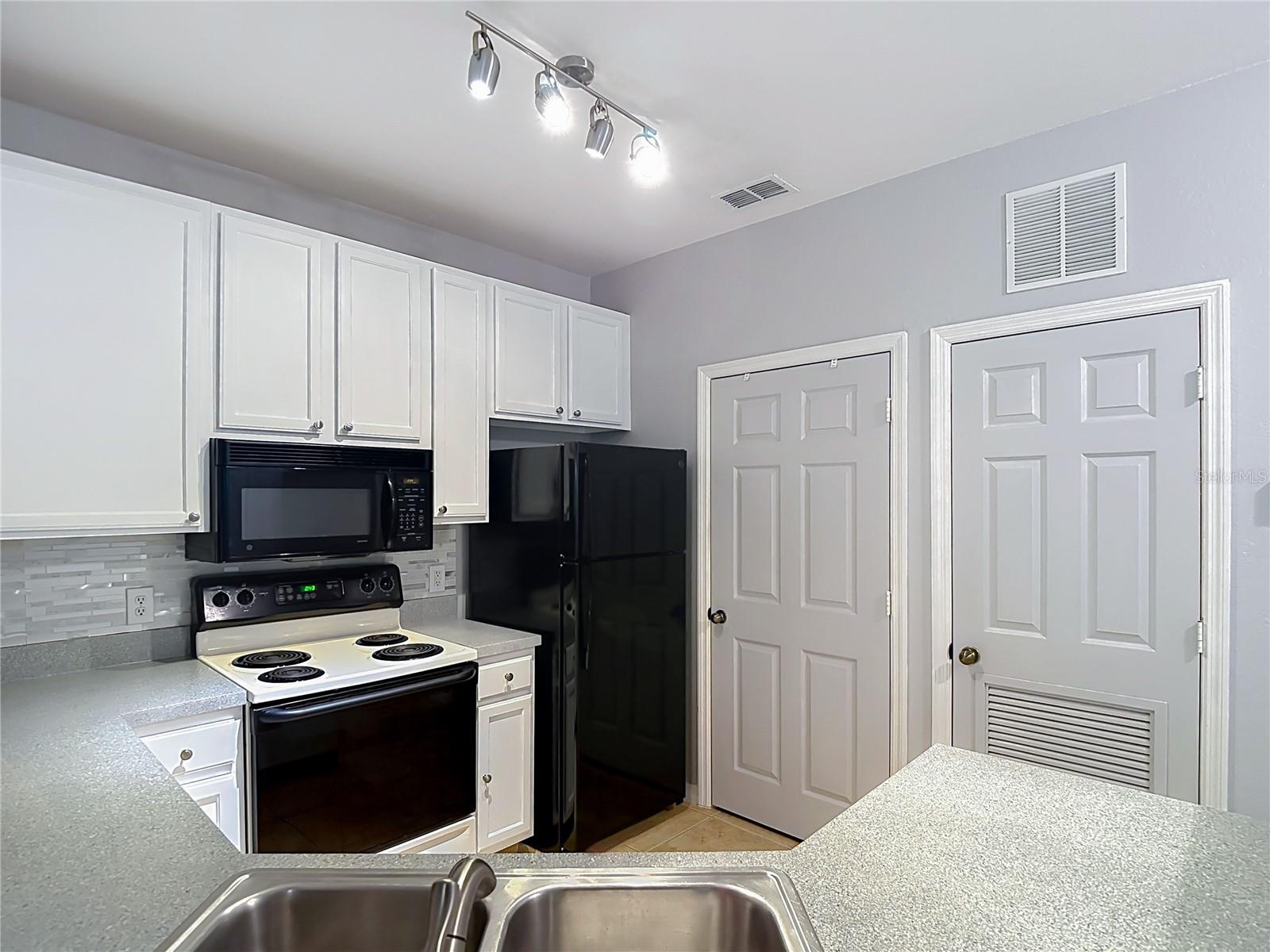 COURTNEY PALMS CONDO - Residential