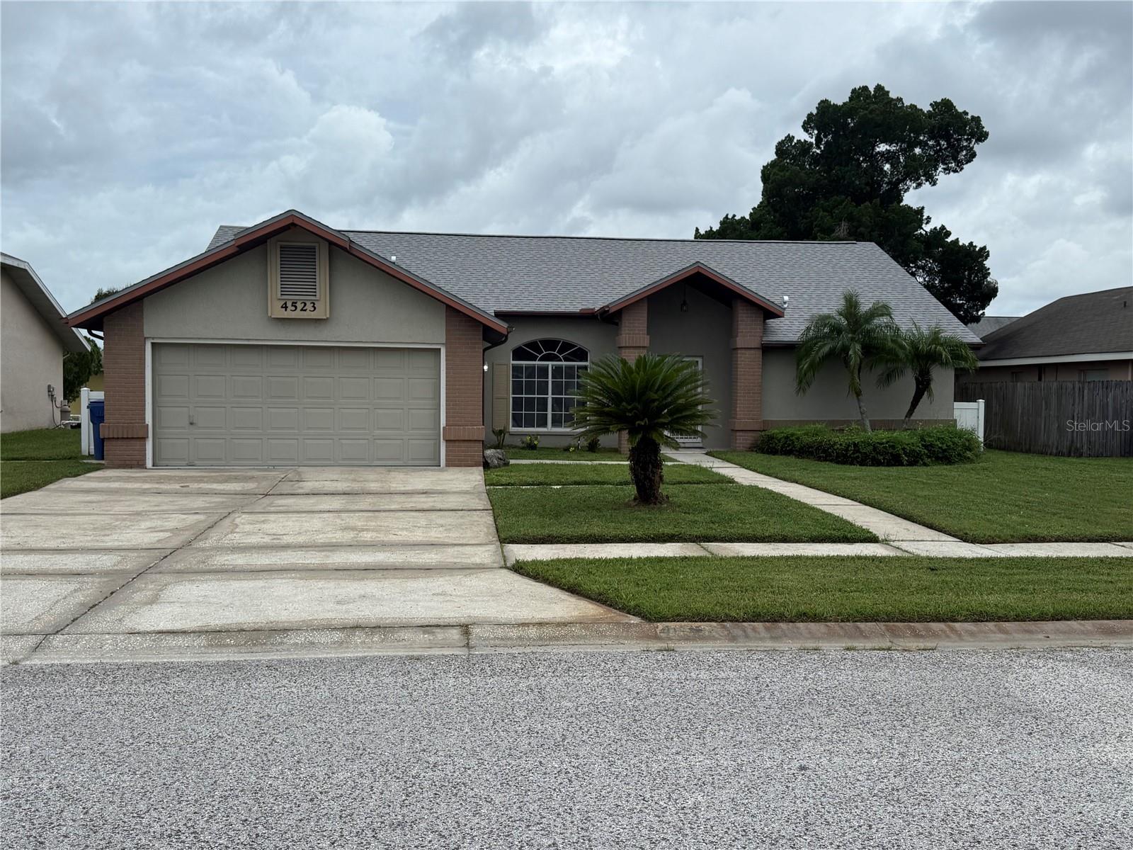 This updated, 3 bedroom, 2 bath home in Wood Trail Village is available for it's next tenant! Brand new luxury, vinyl plank was installed in the entire home, NO CARPET! The interior was also freshly painted. The beautiful kitchen is the center of the home and boasts an open concept to the living and dining areas for all your entertaining needs! The home has many windows which allows natural Florida light. This New Port Richey home sits on a big lot with lots of space in the front, back and sides so you don't feel like you are on top of your neighbors! This is a very nice neighborhood, located right outside of the Trinity area, where many restaurants, shopping options and Trinity hospital is located! It's a quick 40 min drive to Tampa International Airport. Schedule your showing today and see the pride of home ownership these owners have on this beautiful home!
Lawn care and Trash is included in your rent.