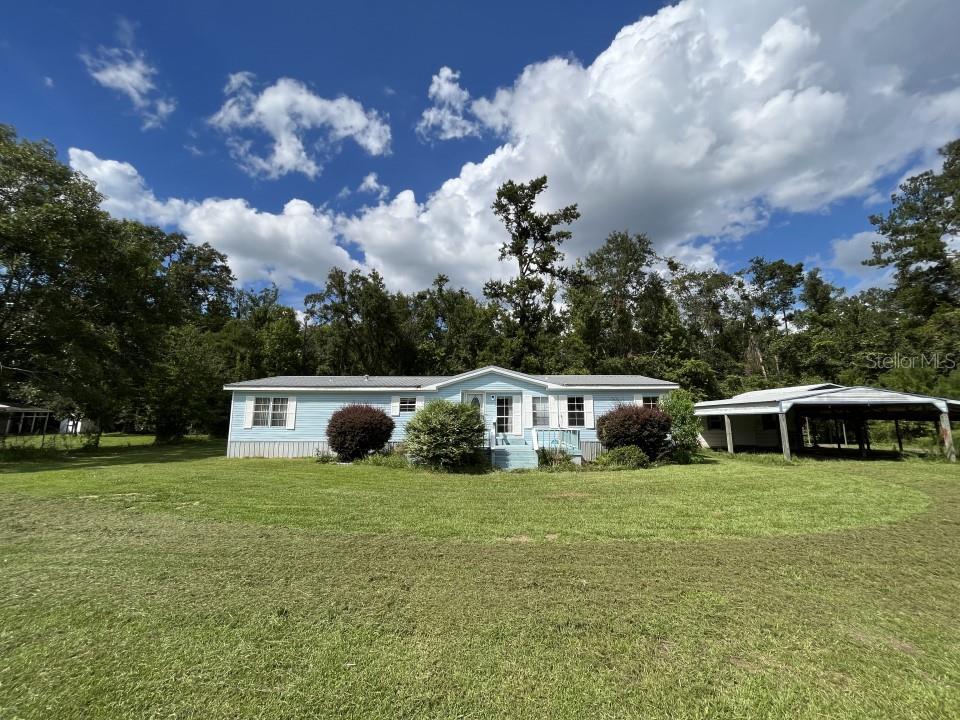 Newly remodeled 3/2.5 mobile home with a large living room and dining area. Large kitchen with island. HVAC was replaced in 2018, all new plumbing throughout, and a brand new well. No VA or FHA loans.