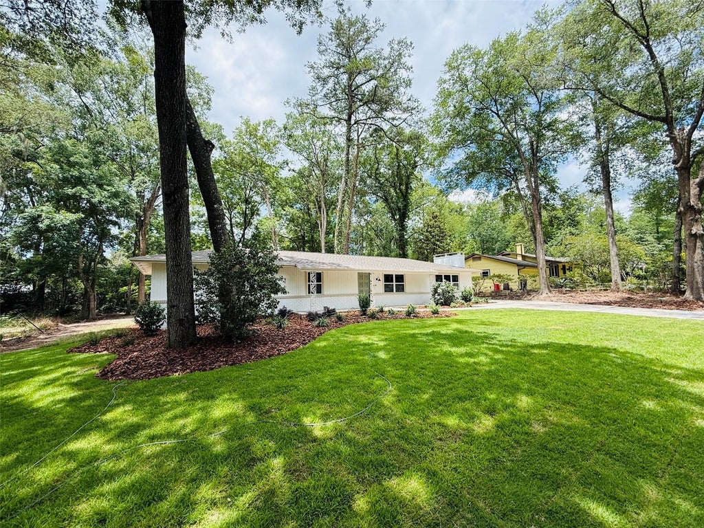 Photo of 900 NW 39th Drive, Gainesville, FL 32605 (MLS # GC541060)