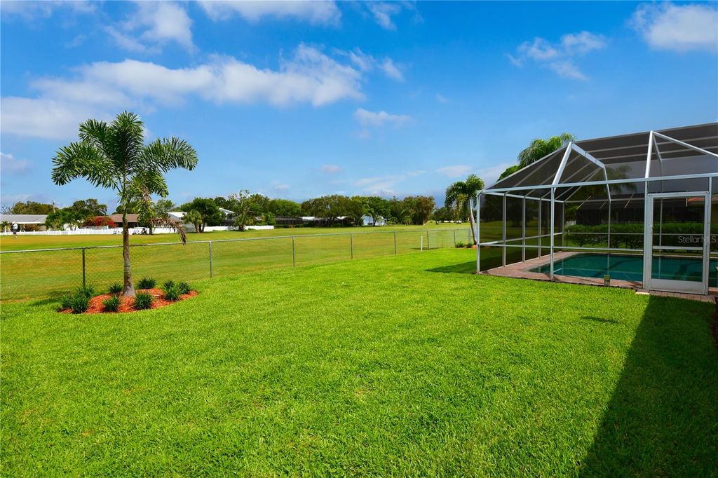 Photo of 6690 Burning Tree Drive, Seminole, FL 33777 (MLS # TB8476840)