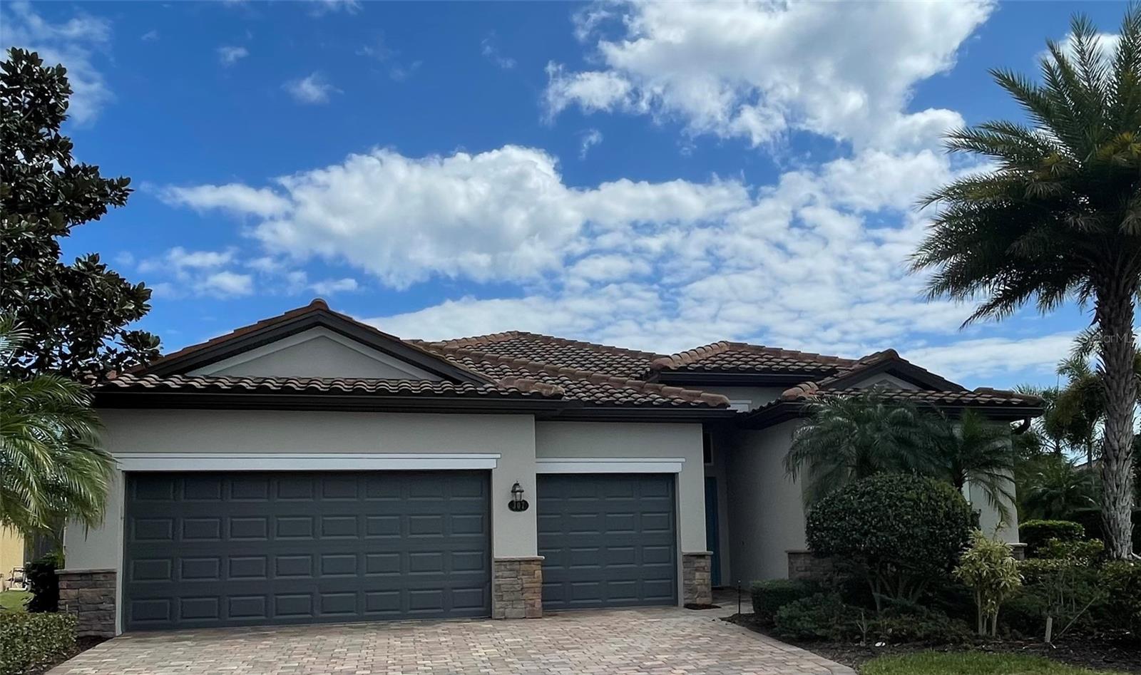 307 WHISPERING PALMS LANE