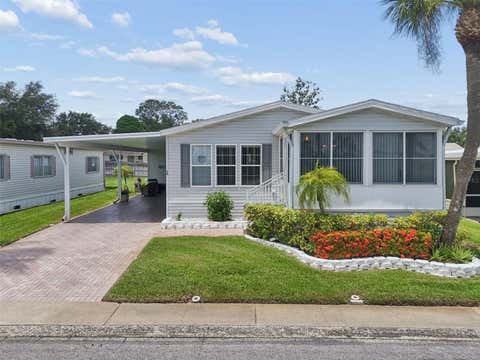 Photo of 18 Mountain Laurel Drive, Palm Harbor, FL 34684 (MLS # TB8531227)