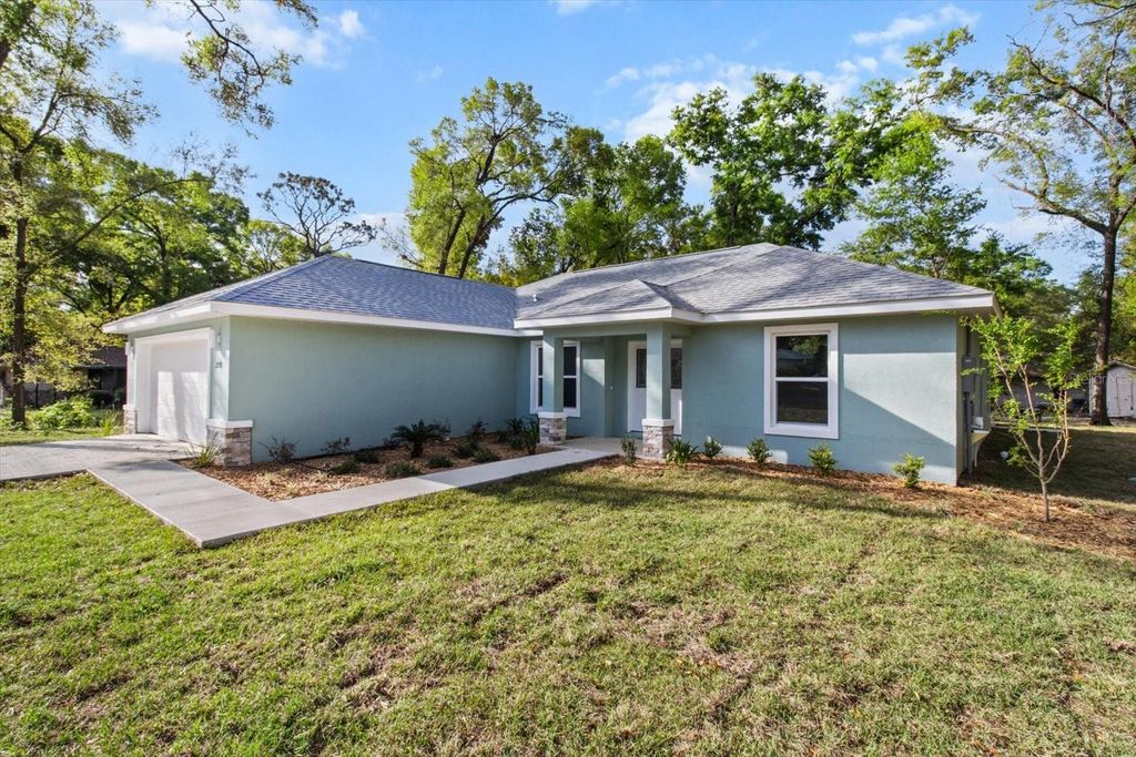 Photo of 2396 W Fairway Loop, Citrus Springs, FL 34434 (MLS # TB8516747)