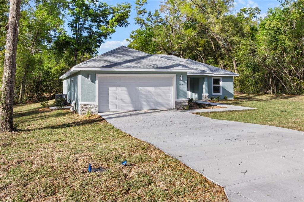 Photo of 2396 W Fairway Loop, Citrus Springs, FL 34434 (MLS # TB8516747)