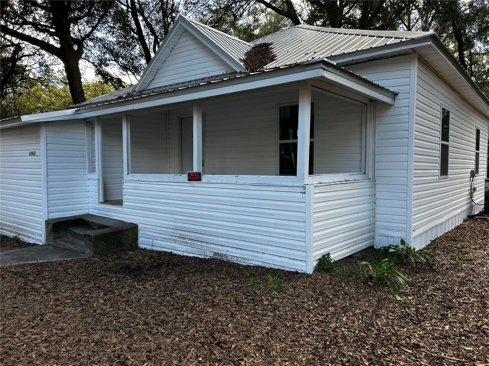 Charming 3-Bedroom Historic Home in Downtown Alachua! Step into a piece remodeled home, perfectly situated in the heart of Alachua's historic district. Recent updates provide modern comforts. The home features a new AC unit (2018), a New metal roof (2024), and a new water heater (2024). New windows were installed in 2024, the plumbing was redone in 2024, and the electrical panel was updated in 2024. The Morden kitchen is perfect for those who love to cook. This cozy 1582 square foot house offers 3 bedrooms and 2 bathroom, nestled on a spacious 18,731 square foot lot. Enjoy the convenience of walking to downtown Alachua, where you'll find quaint shops, delightful restaurants, Publix, Lowe's, Pharmacy's, daycare and many more. Located just minutes from Legacy Park and local schools, this historic gem is ideal for those seeking a blend of vintage charm and modern amenities in a prime location. The fenced-in yard and space for outdoor activities, and with no HOA and no carpet, this home is as low-maintenance.
