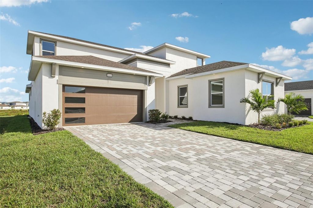 Photo of 10444 Torchwood Sea Way, San Antonio, FL 33576 (MLS # TB8436013)
