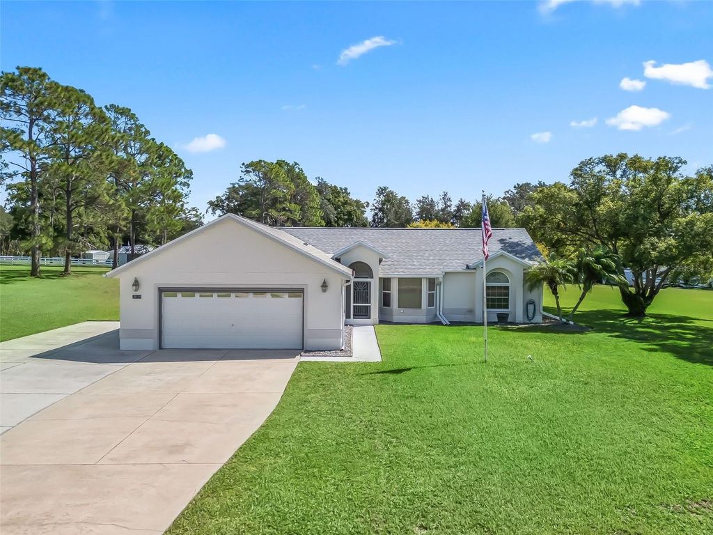 Photo of 36130 S Grays Airport Road, Fruitland Park, FL 34731 (MLS # G5103213)