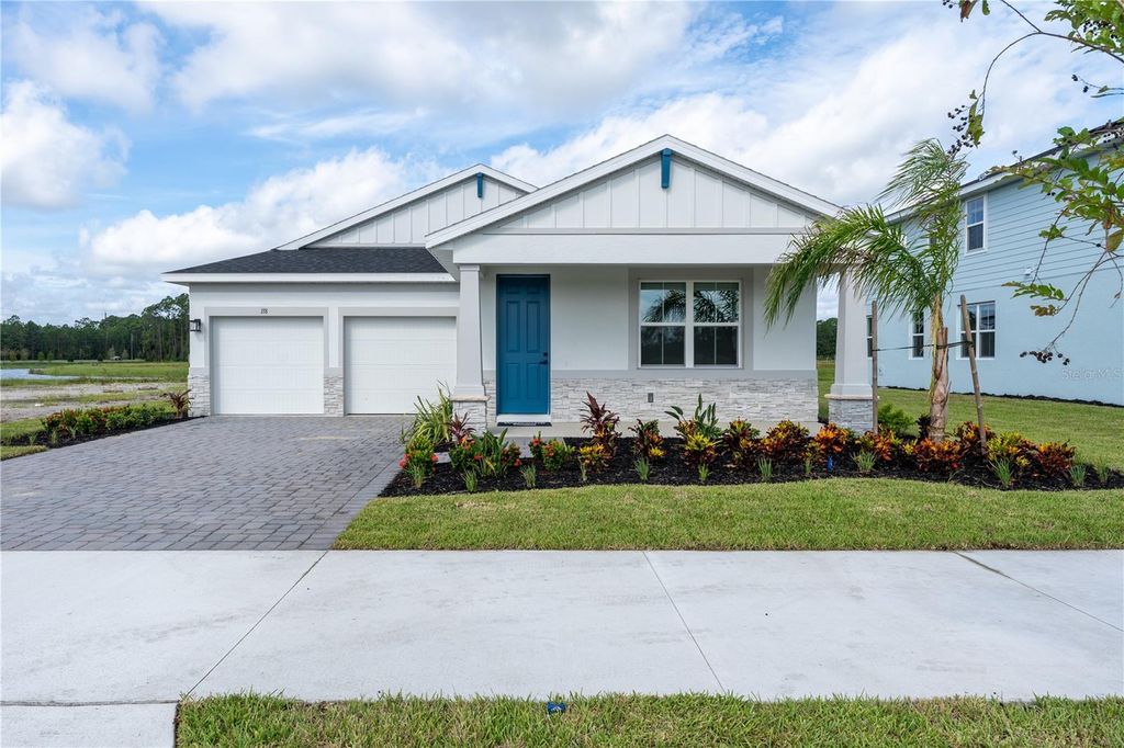 Photo of 3135 Tiger Palm Way, New Smyrna Beach, FL 32168 (MLS # W7881972)