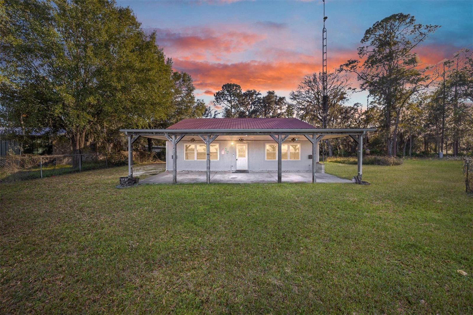 Enjoy the great outdoors in this spacious 3 BR 2 bath WATERFRONT home tucked away on private Lake Pegram in Marion County. This property could be that perfect weekend get-a-way or you could make it your full-time residence for enjoyment throughout the year. The large great room overlooking the lake has knotty pine walls and plenty of space for a pool table. The kitchen has plenty of cabinets for storage and lots of counter space with a center island. Home has a metal roof, updated windows, updated 200-amp electric service, and new electric feed and surge protection. Exterior features include a large, covered patio looking out onto the lake, fenced in area for your dog, and several outdoor sheds for storage. This is a GOOD PRICE for a waterfront property on a private lake that has boating, skiing, fishing, and swimming. This is the type of property where real memories are made! Assumable VA mortgage
