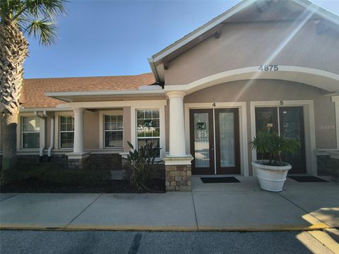 Photo of 4875 Palm Coast Parkway NW #4, Palm Coast, FL 32137 (MLS # FC317144)