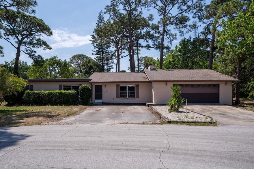 Opportunity awaits you!  This 3 bedroom, 2 bathroom home is a renovators paradise.  There are two Parcel ID’s included in the purchase price that total 1.33 acres. Both parcels are zoned MH-5, Urban mobile home zoning classification.  One mobile home, single family standard or manufactured modular home is permitted. This is a cash sale and is being sold as is.  Location is key!  Just minutes from the public boat ramp, shopping, restaurants, and the beach.  Schedule your showing today, this will not last long!