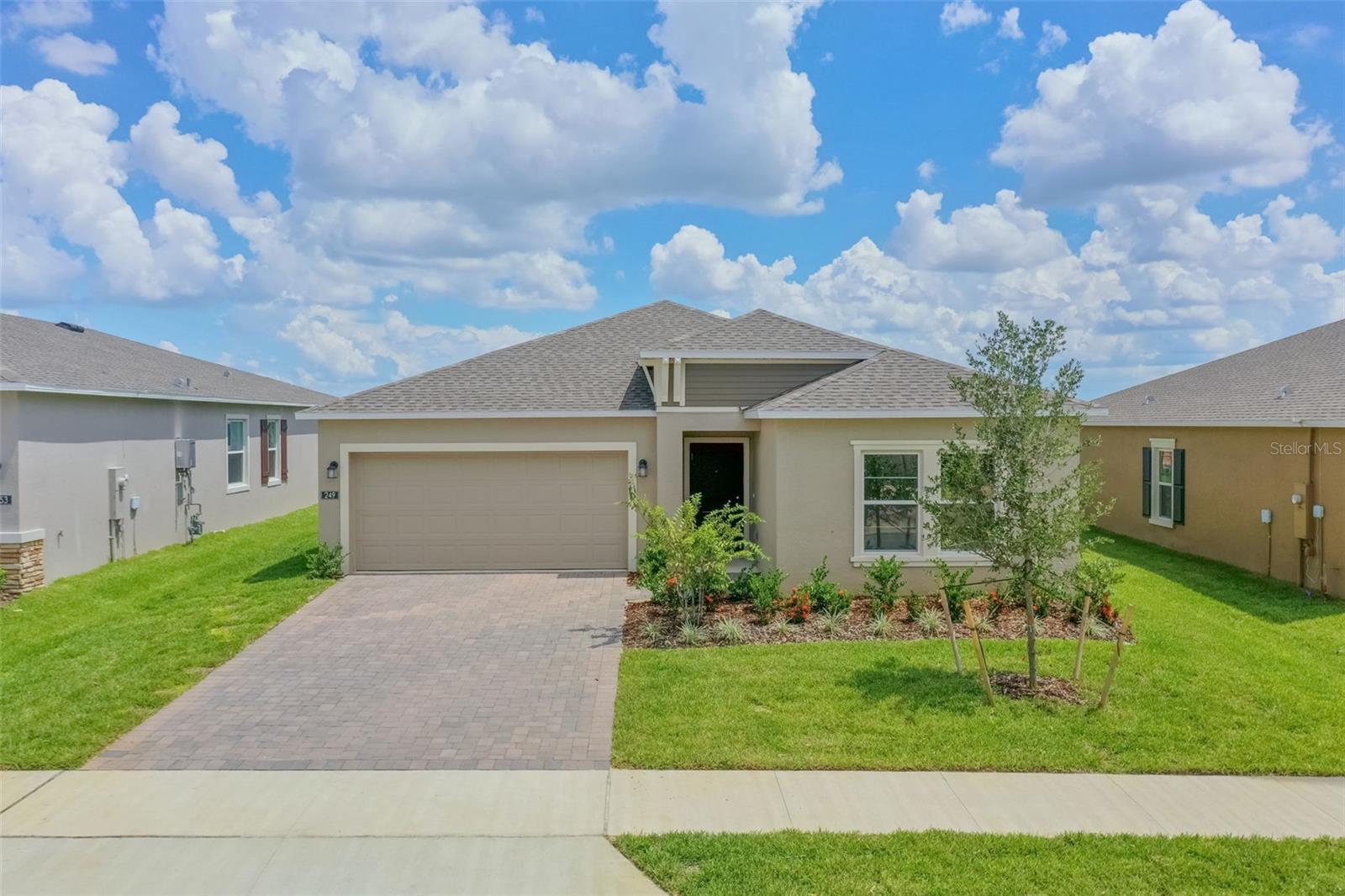 Be the very first to call this brand-new home in Waterstone, Groveland’s newest community, yours. This spacious 4 bedroom, 2 bath home offers over 1,900 sq. ft. of modern living, complete with a 2-car garage and all the upgrades you’ve been looking for. Step inside this never been lived in before home to a bright, open layout filled with natural light and peaceful views. The chef-inspired kitchen features stainless steel appliances, a gas oven range, quartz countertops, and plenty of storage. The oversized walk in pantry is a huge bonus too. Enjoy the open concept living and dining area, perfect for entertaining, with views overlooking your spacious backyard. A washer and dryer are included for your convenience as well. Your rent covers internet and lawn care. Waterstone has exciting amenities on the way, including two resort-style pools, a dog park, and scenic walking trails. Be the first to enjoy all this beautiful home has to offer.