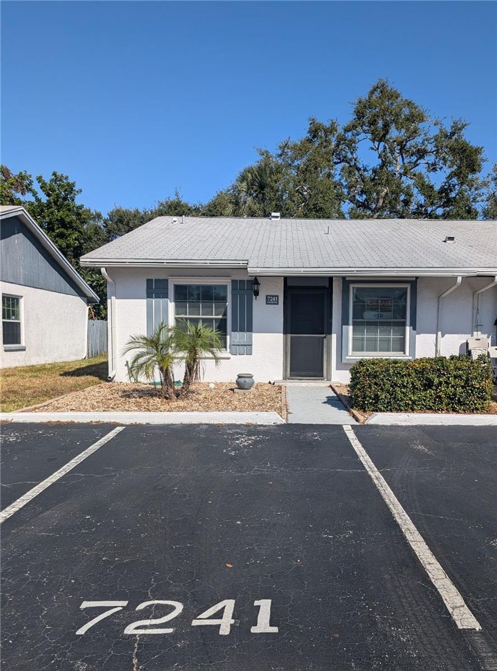 Photo of 7241 Parkside Villas Drive N, St Petersburg, FL 33709 (MLS # TB8447198)