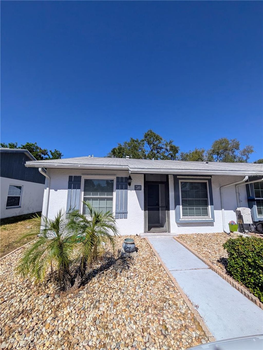 Photo of 7241 Parkside Villas Drive N, St Petersburg, FL 33709 (MLS # TB8447198)