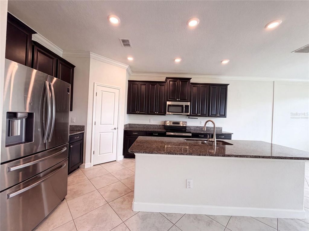 Photo of 9709 Ivory Drive, Ruskin, FL 33573 (MLS # O6428343)