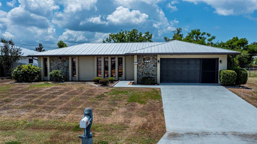 Charming 3 bedroom 2.5 baths. Fenced yard with storage shed. Metal roof. New roof over lanai. New A/C 2024. Pool resurfaced 2021. New hot water heater 2025. New front blinds 2024. New pool pump 2023. Pool electric heat. Outside home painted 2022. New pool cage 2024. Hurricane shutters on big windows. All toilets have been replaced within last 3 years. Fully furnished home.