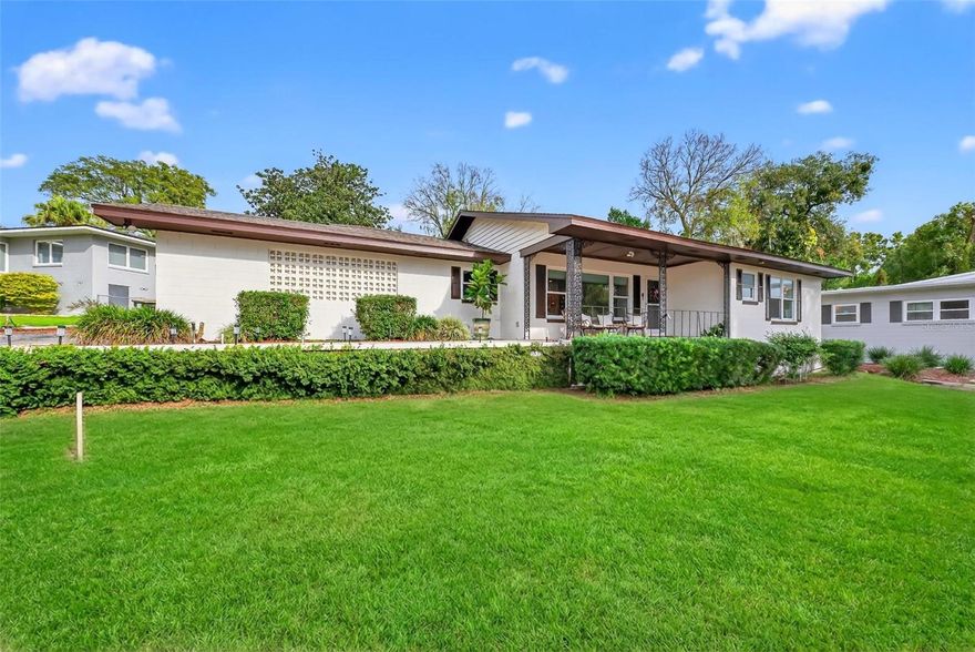 Enjoy stunning East Crooked Lake sunsets from your front porch in this charming historic home! Featuring original wood floors, this home offers a bright open floor plan perfect for daily life and hosting gatherings. The spacious kitchen boasts quartz countertops, stainless steel appliances, and an island that opens up to your living space. Each bedroom includes its own en suite bath and the bonus room is a perfect space for extra living square footage, an office, or a 3rd bedroom. Whether you are soaking up the views from your front porch or enjoying your fully fenced in backyard, this home is a wonderful retreat! Recent upgrades include 2025 septic tank and drain field (seller is re-sodding grass), 2025 a/c, updated primary bathroom, new light fixtures and a 2023 hot water heater. Located minutes from both downtown Eustis and Historic Mount Dora, you are also close to and major roadways including the 429/414 connector for easy access to Orlando and Florida's beaches. A must-see home in a fantastic Central Florida location!