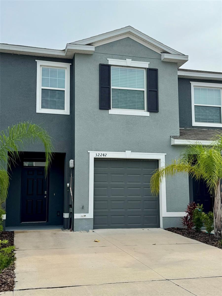 Prime Location! Experience the perfect blend of comfort and convenience in this well-maintained 1,673 sqft 3-bedroom, 2.5-bathroom townhouse, 1 car garage, nestled in the sought-after Epperson community of Wesley Chapel. Located close to Metro Lagoon, and easy access to shopping, dining, entertainment and major highways. Boasting serene water views from a screened lanai, this two-story home offers a tranquil retreat with modern amenities and is ideal for a small family. Townhome includes extended tile in the main living and dining area, Laminate flooring throughout all second floor, granite countertops throughout, under-mount kitchen sink, shower wall tile, a stainless-steel appliance. All three bedrooms are located on the second floor, providing privacy and separation from the main living areas. In-unit washer and dryer situated on the second level.
Rent includes HOA and lawn maintenance, High-speed Internet and basic cable TV. Tenants are responsible for the utilities. Renters insurance is mandatory. The minimum rental period is one year. No-smoking inside home policy. Small home-trained pets below 25 lbs are welcome, subject to a non-refundable pet fee. Prospective tenants must undergo credit, rental history, employment and background checks.