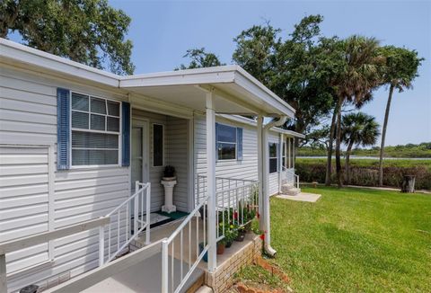 Photo of 735 Navigators Way, Edgewater, FL 32141 (MLS # NS1088523)