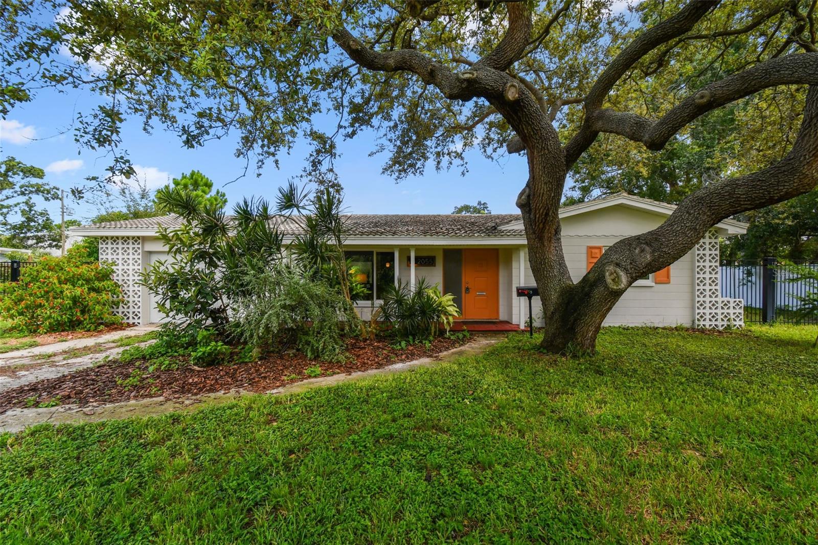 Under contract-accepting backup offers. Discover the charm, durability, and location you’ve been looking for at 2055 Pinellas Point Drive South, a stylish mid-century block home nestled in one of St. Pete’s most scenic and accessible neighborhoods. This 2-bedroom, 1-bath single-story gem offers classic character, smart upgrades, and huge potential—perfect for anyone craving the Florida lifestyle with room to grow.
Inside, you’ll find gleaming original terrazzo floors, a nod to timeless Florida design, along with a fully updated bathroom and modernized kitchen featuring clean cabinetry, solid-surface counters, and stainless steel appliances. The home has been freshly painted inside and out, and is equipped with impact-rated windows throughout, providing energy efficiency, storm protection, and peace of mind. Home remained high and dry during last years storms and is located in flood zone X.
The attached garage is more than just storage—it's a bonus opportunity. Already outfitted with a fully plumbed second bathroom with shower, it’s ready to become a true primary suite, guest quarters, or office with minimal renovation. The layout and infrastructure are already in place for a seamless conversion.
Step outside into the oversized, fully fenced backyard, offering mature landscaping and plenty of space for a pool, patio, garden, or future expansion. Whether you're entertaining, relaxing, or planning for future upgrades, the outdoor space offers flexibility and privacy.
Location-wise, this home is a boater’s and nature lover’s dream. You’re minutes from Bay Vista Park and Maximo Park, both offering public boat ramps, walking trails, playgrounds, and waterfront views. Launch your boat or kayak and be on the open water in minutes. Love the beach? You're a short drive to St. Pete Beach and Fort De Soto Park, two of Florida’s most acclaimed stretches of coastline. Craving culture and cuisine? Downtown St. Pete is just minutes away, packed with restaurants, art galleries, breweries, and live entertainment.
Whether you're looking for a stylish starter, an income-producing property, or a future-forward home with expansion options, 2055 Pinellas Point Drive checks all the boxes.
Live the lifestyle. Launch the boat. Soak in the sunsets. This is Pinellas Point living at its best.