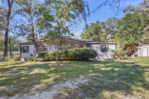 Photo of 5016 NW 170th Street, Alachua, FL 32615 (MLS # GC534645)