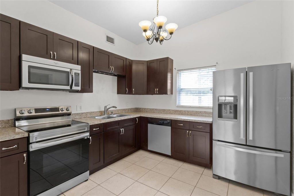 Photo of 6711 Dartmouth Avenue N, St Petersburg, FL 33710 (MLS # TB8545677)