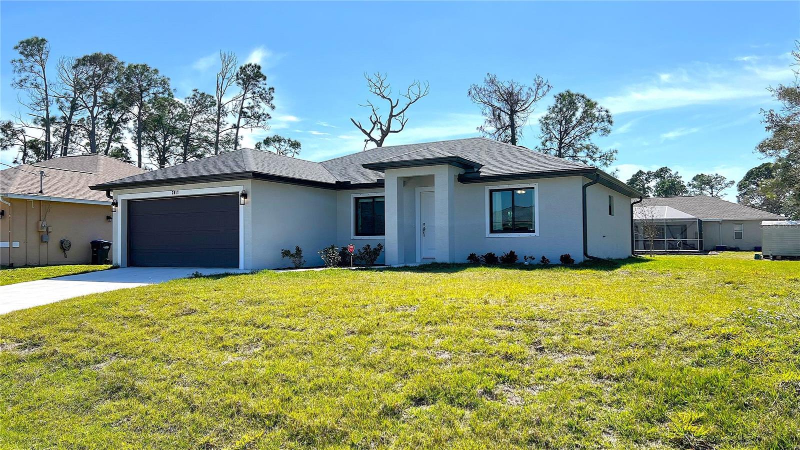 POOL PLANS AVAILABLE FOR 60K!! SOLID CONCRFETE HOME IN X FLOOD ZONE (NO FLOOD INSURANCE REQUIRED) Check out this Move In Ready 3 Bed 2 Bath home situated in a very desirable area of North Port. Step inside to discover a spacious open floor plan, ideal for both relaxing and entertaining. The interior boasts high ceilings, elegant finishes, and ample natural light throughout. This home is located on a cul-de-sac in an area of all newer homes. This lovely home showcases superior craftsmanship and modern design elements. You will enjoy upgraded stainless steel appliances, ceiling fans in every room, upgraded lighting, and Luxury Vinyl Plank Throughout. The lanai is covered and screened and overlooking a large backyard with privacy fence fit for a pool!
Enjoy the tranquility and convenience of this prime location. This area is within minutes to shopping, restaurants, golf, many beaches, and so much more. Enjoy the Florida lifestyle you deserve! Furniture negotiable.
Don’t miss out on the opportunity to own this exceptional home in North Port – schedule a showing today!
