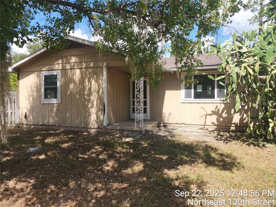 This 2-bedroom, 1.5-bath home sits on a .23-acre lot and offers a solid foundation for someone ready to bring their vision and a little elbow grease. Featuring laminate wood flooring throughout most of the home and tile in the bathrooms and laundry area, the layout is functional and has great potential. The kitchen offers plenty of cabinet space, and ceiling fans are installed throughout the home. A screened-in patio leads to the in-ground pool, which could be a standout feature with some updates and maintenance. Outside, the spacious lot provides room to expand, garden, or create your own backyard oasis. While the home does need work, it presents a fantastic opportunity for investors, DIY enthusiasts, or buyers looking to customize a space to their taste.
With the right updates, this property could truly shine — don’t miss the chance to transform this house into a home!