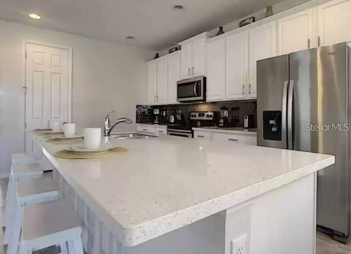Photo of 9033 Flamingo Key Way, Kissimmee, FL 34747 (MLS # O6424933)