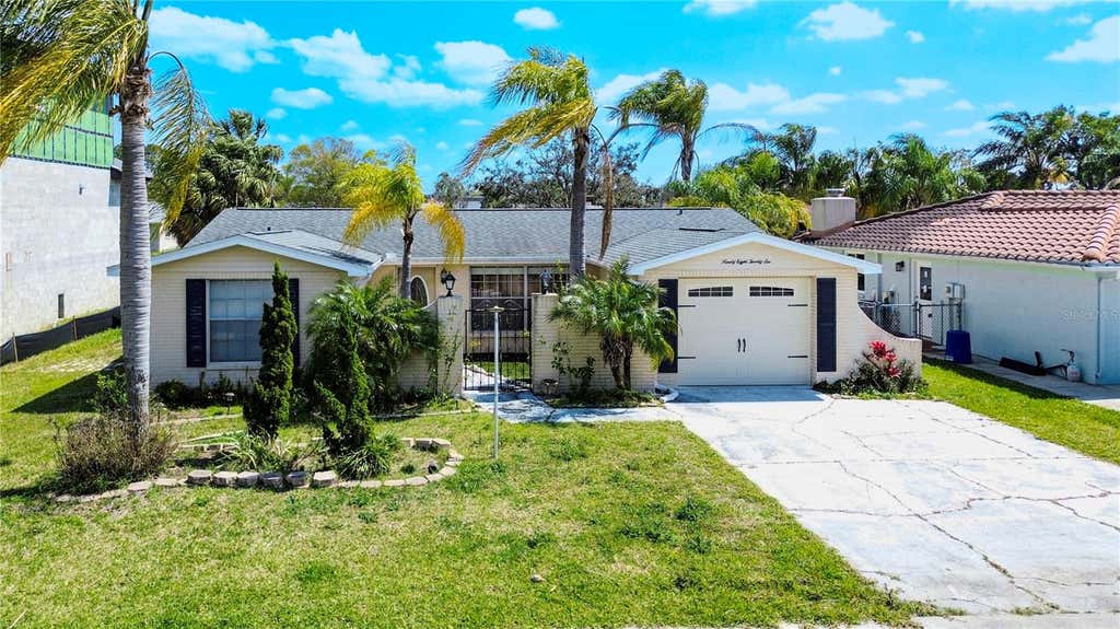 Photo of 9826 Island Harbor Drive, Port Richey, FL 34668 (MLS # TB8540027)