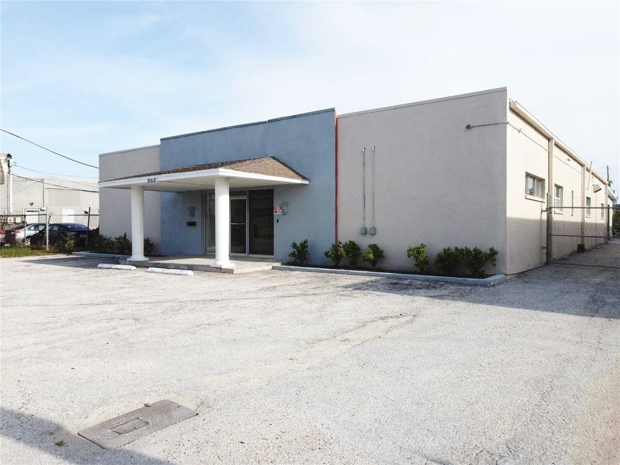 Versatile commercial property in UNINCORPORATED ST. PETERSBURG located at 3160 46th Ave N. for SALE. Introducing a well-maintained, spacious, UPDATED industrial property that is approximately 7,200 sq ft situated on a .41 ACRE LOT. This CONCRETE BLOCK construction building is ideal for businesses seeking office, warehouse or production space. This property is zoned E-1 (Employment 1 District). Permitted uses for this zoning include warehousing, light manufacturing, trade-related services, automotive services, wholesaling, technology and research facilities, and specialty uses. The building features 5,100 sq ft heated space, divided into THREE SECTIONS. The first portion includes 1,600 sq ft with EIGHT OFFICE ROOMS and a PRIVATE RESTROOM. The second area offers approximately 700 sq ft with TWO ADDITIONAL OFFICES, TWO RESTROOMS, and a KITCHENETTE. The third space consists of 2,800 sq ft of PRODUCTION AREA space. In addition, there is 2,100 sq ft of SERVICE CANOPY in providing additional covered workspace. The building is equipped with 3 PHASE POWER, which is crucial for businesses that rely on heavy machinery. There is AMPLE PARKING with 8 spaces in the front and the lot is secured with a CHAIN-LINK FENCE. In the back there is 3,000 sq ft of paved surface for additional space including a LARGE ALUMINUM SHED. RECENT UPDATES INCLUDE a NEW AC, UPGRADED ELECTRICAL PANEL, NEWLY RENOVATED OFFICE ROOMS, BATHROOMS, and a KITCHENETTE. FRESH INTERIOR and EXTERIOR PAINT, NEW EXTERIOR STUCCO, NEW LIGHTING IN OFFICE ROOMS. It is move-in ready for your business needs. Don’t miss out on the incredible opportunity located in a desirable industrial and commercial district in St. Petersburg! The location is very CONVENIENT with US 19 to the west and 28th street to I-275 to the east.