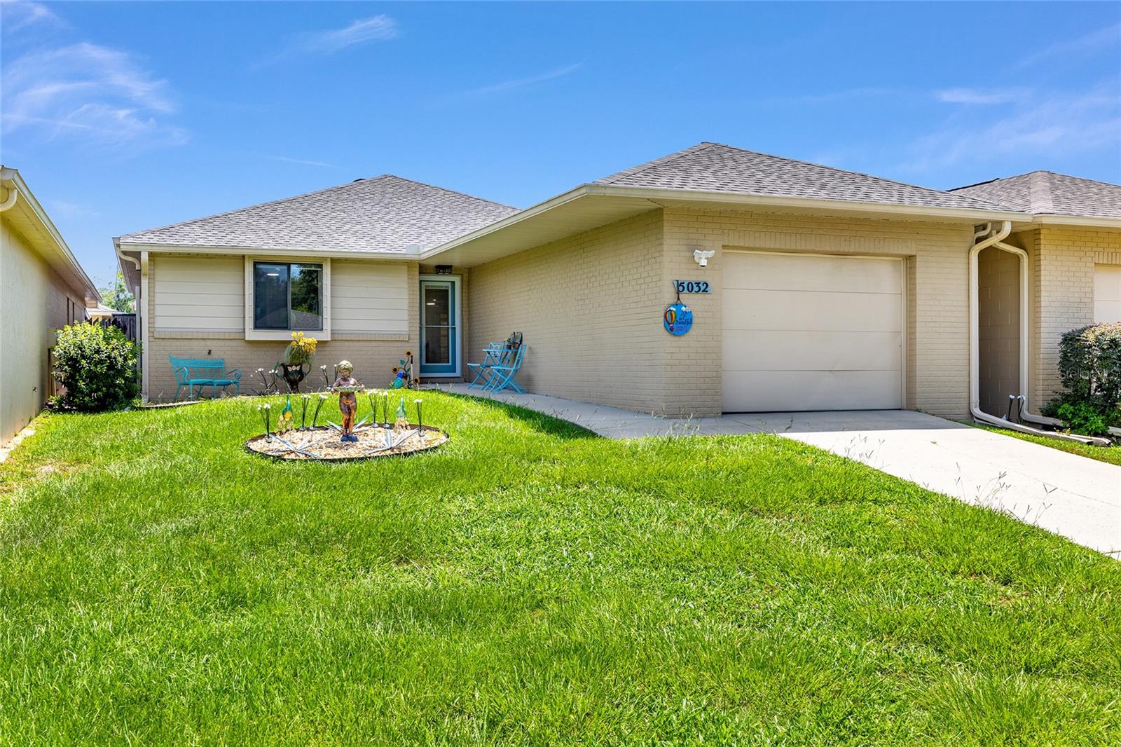 Beautiful 2/2 home with 1 car garage in the Villas of Belleview, a popular 55+ community! IMMACULATE & MOVE-IN READY! Free standing concrete block home ~ no shared walls. 2023 ROOF ~ 2024 HVAC ~ 2024 WATER HEATER ~ updated bathrooms, new front door, new fans, new interior paint, and new LVP flooring throughout! NO CARPET. Huge living room has vaulted ceilings, skylight, and French doors to the lanai. OPEN FLOOR PLAN. Kitchen has breakfast bar, pantry, and dining area. Split plan with spacious bedrooms. Primary bedroom has walk-in closet and ensuite with walk-in shower. Privacy fenced outdoor living space with large lanai and extended patio. Garage has laundry closet, including washer/dryer. Great location convenient to shopping, dining, medical, parks, and is an easy drive to Ocala and the Villages. Low HOA includes Spectrum internet, lawn care, community pool, clubhouse, basic cable, and trash/recycling. No sign.