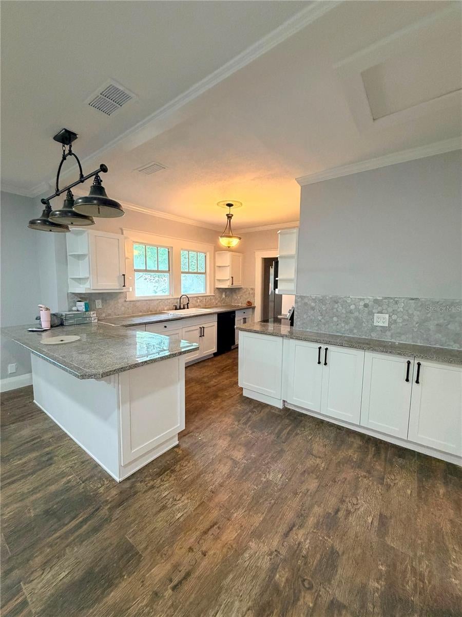 Photo of 708 E Crenshaw Street, Tampa, FL 33604 (MLS # TB8524590)